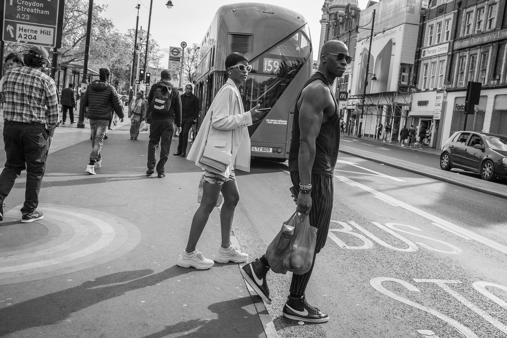 Geez_Brixton_Couple_crossing_high_st