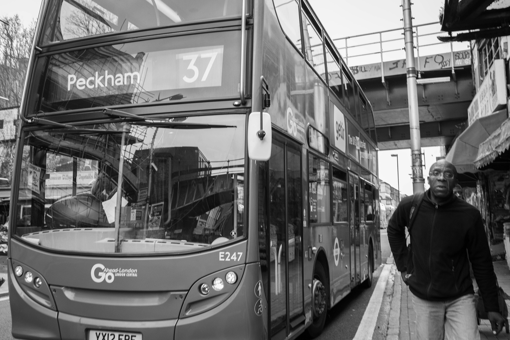 Geez_Peckham_bus_and_man_2048